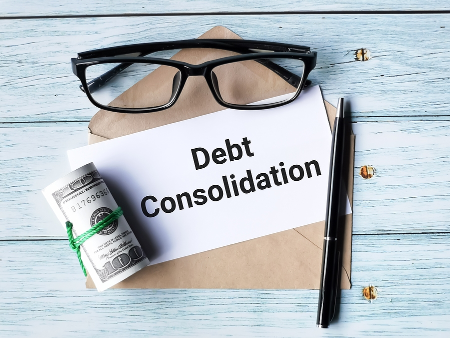 Finance Concept. Text Debt Consolidation Written On White Paper